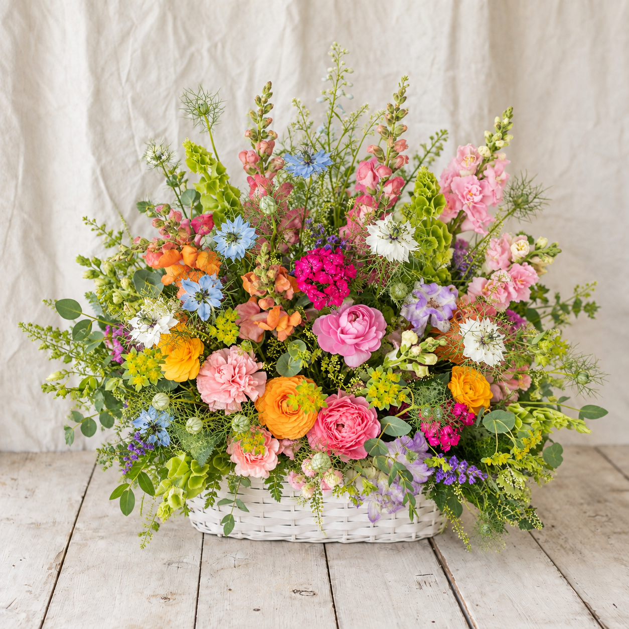Garden Comfort mid-size colorful garden-style sympathy flower basket by Rooted Flowers